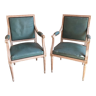Paire de fauteuils Louis XVl en moleskine bleu celadon et cérusés beige