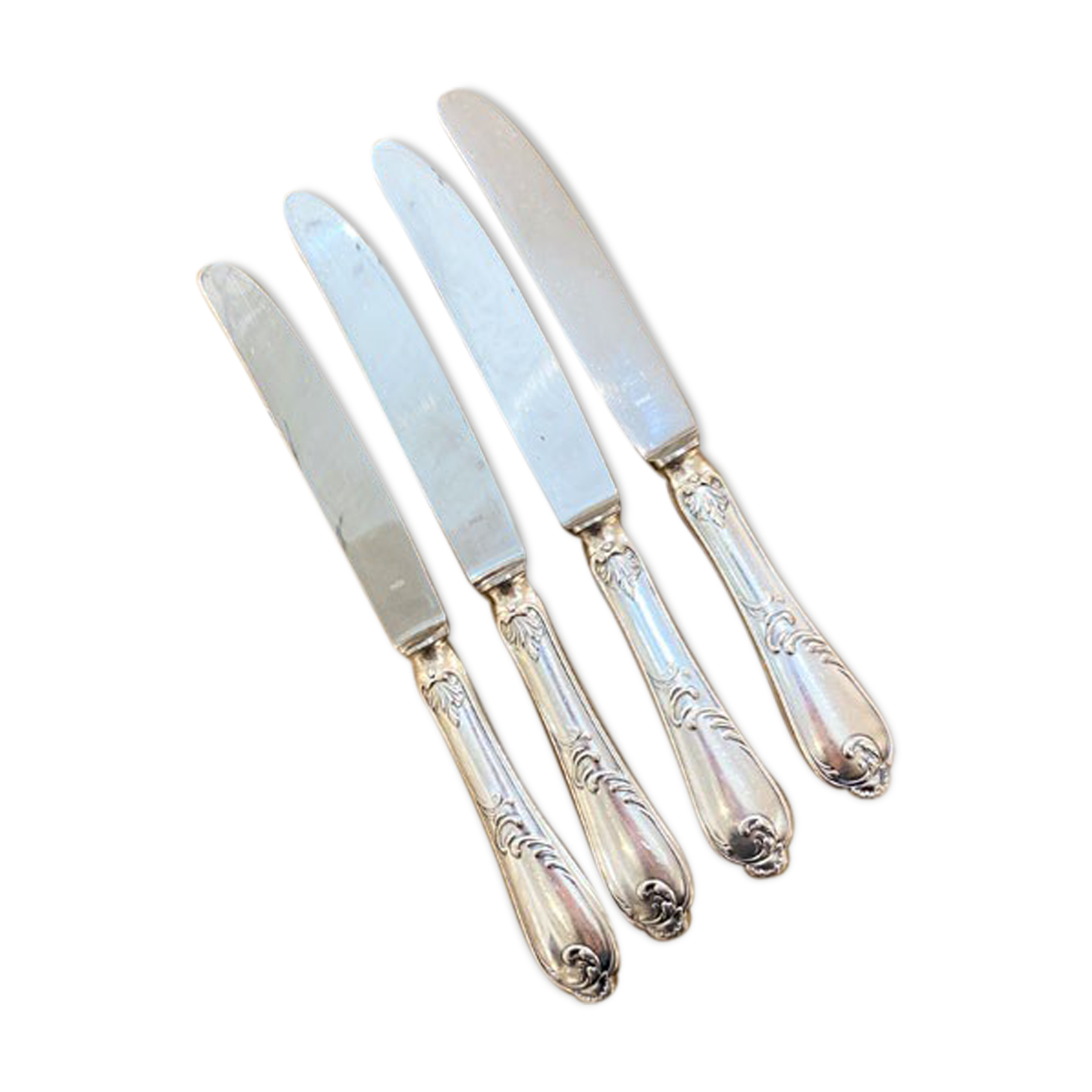 Series of 4 silver metal rocaille knives