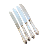 Series of 4 silver metal rocaille knives