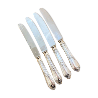 Series of 4 silver metal rocaille knives