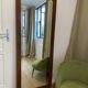 Large vintage Art Deco bizote mirror to place or hang, solid wood frame