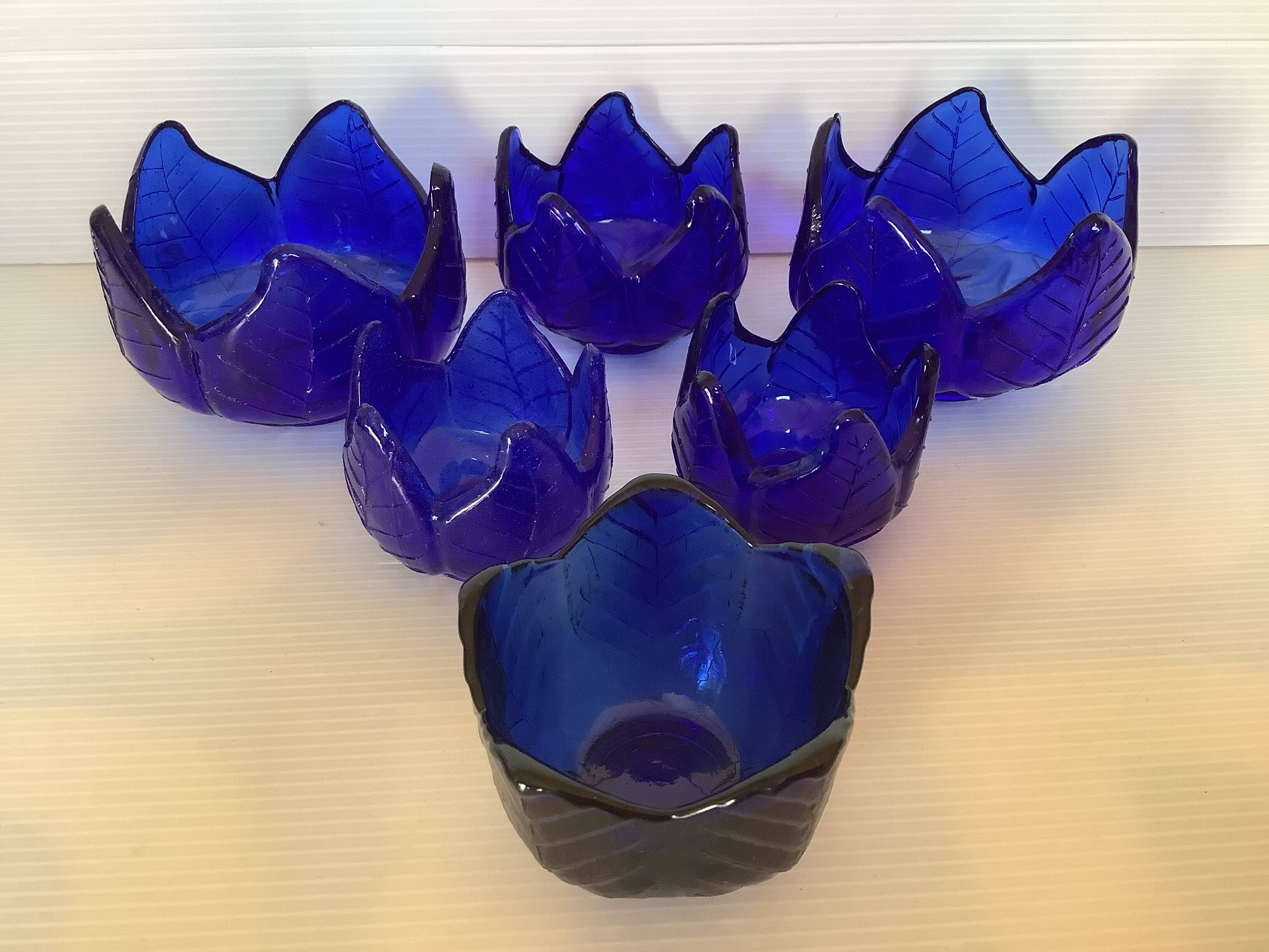 Six stackable cobalt blue candlesticks