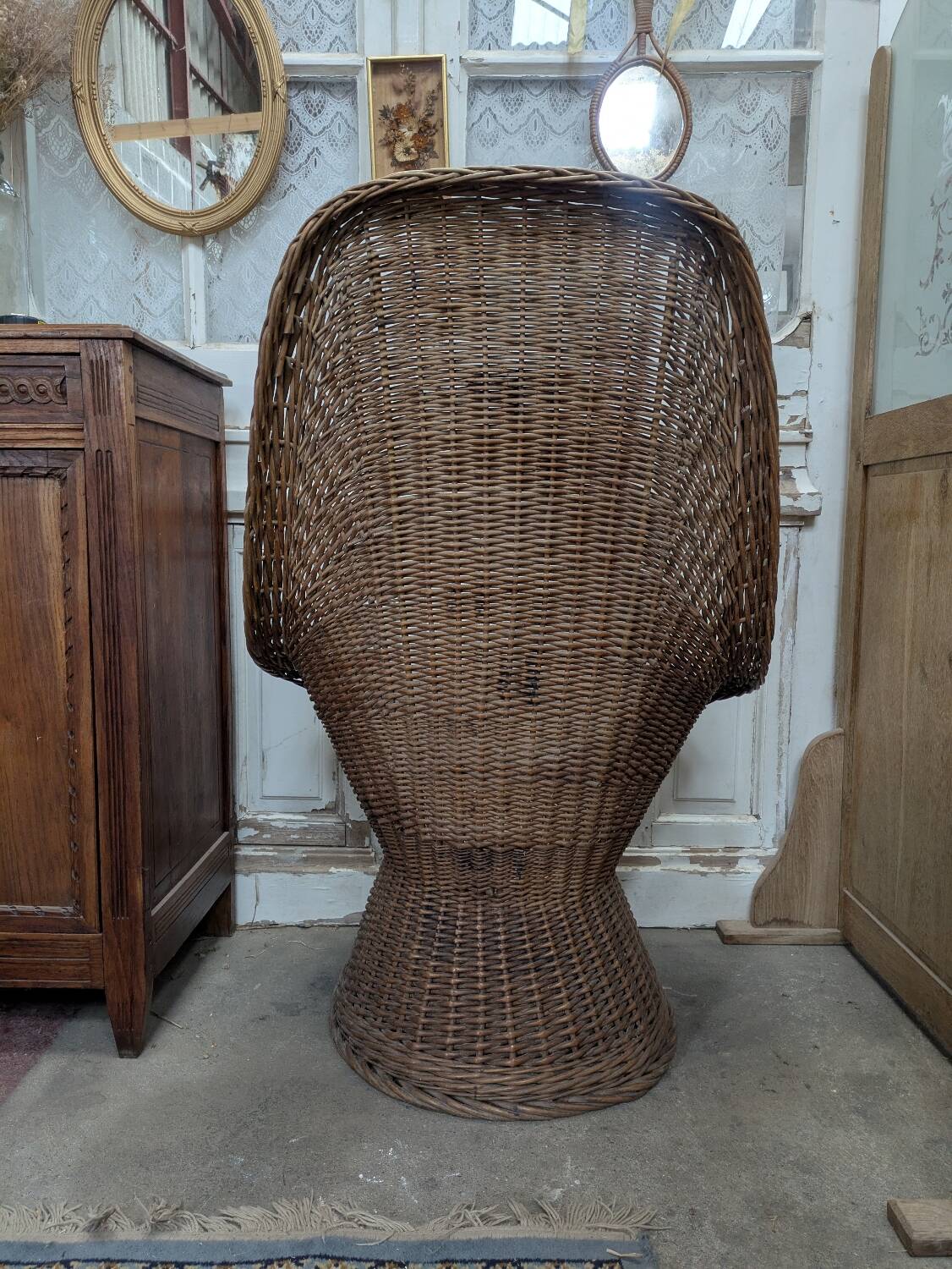 Large woven rattan armchair