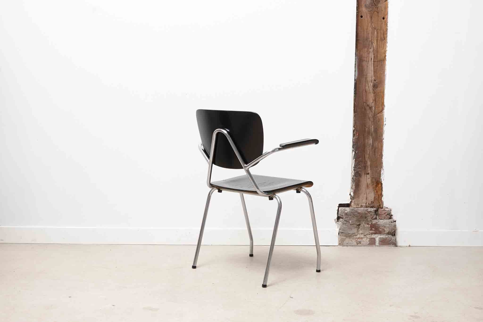 Vintage chair Kho Liang Black and metal with armrests