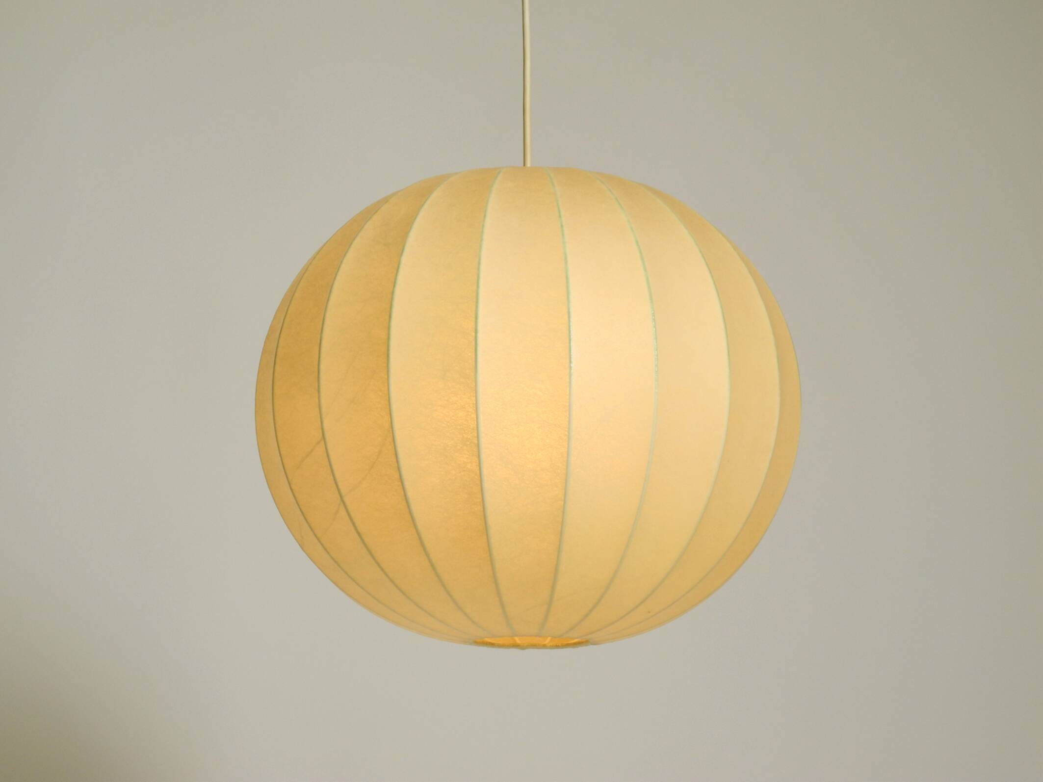 Beautiful Cocoon pendant lamp in very good vintage condition from the 1960s