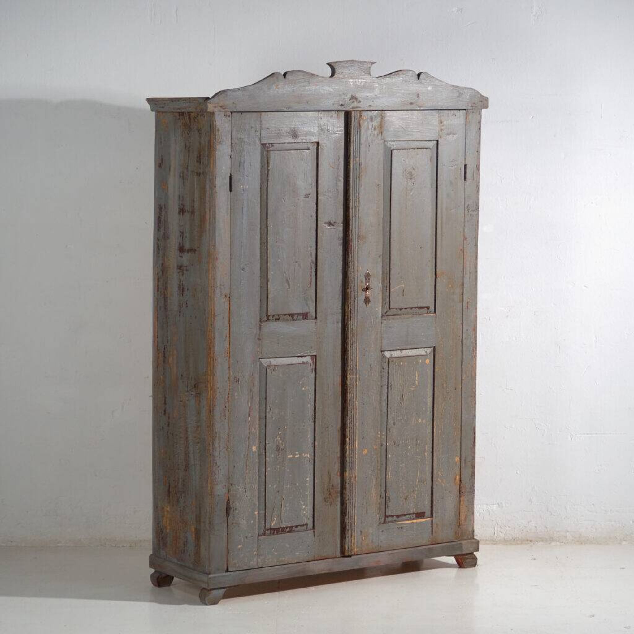 Rustic painted wardrobe in wood, Central Europe, circa 1900–1920