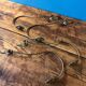 4 curtain tiebacks in art deco bronze brass