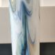 Tubular vase in white opaline, polychrome smoke volutes. Snowflake/Dalian Co. Ltd. High 29 cm