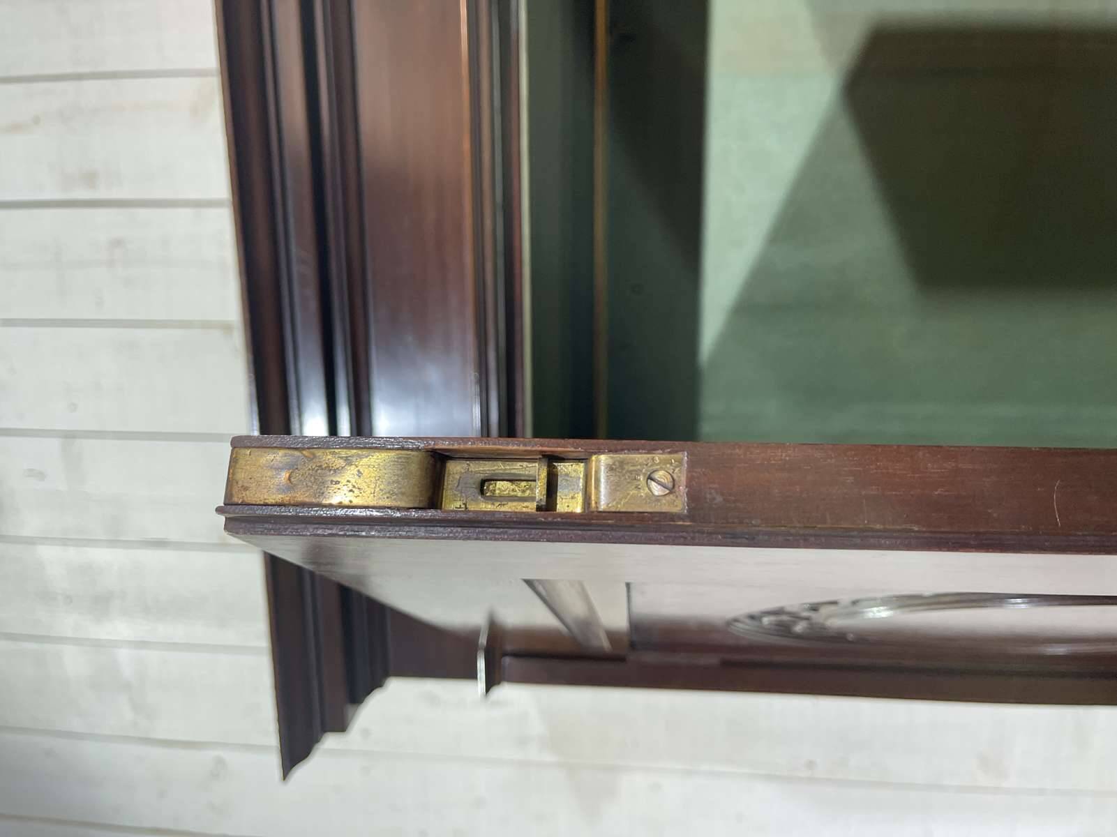 19th-century English mahogany three-door wardrobe.