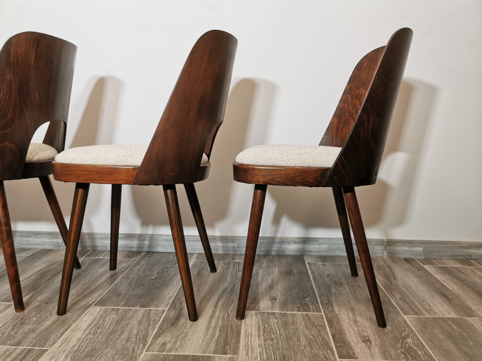 Dining chairs by Oswald Haerdtl