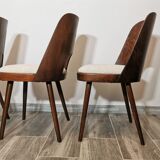 Dining chairs by Oswald Haerdtl