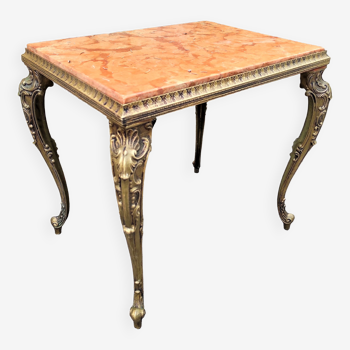 Coffee table with curved legs and pink marble top