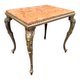 Coffee table with curved legs and pink marble top