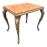 Coffee table with curved legs and pink marble top