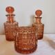 Set of 4 bottles and an art deco box in pink Bayel crystal