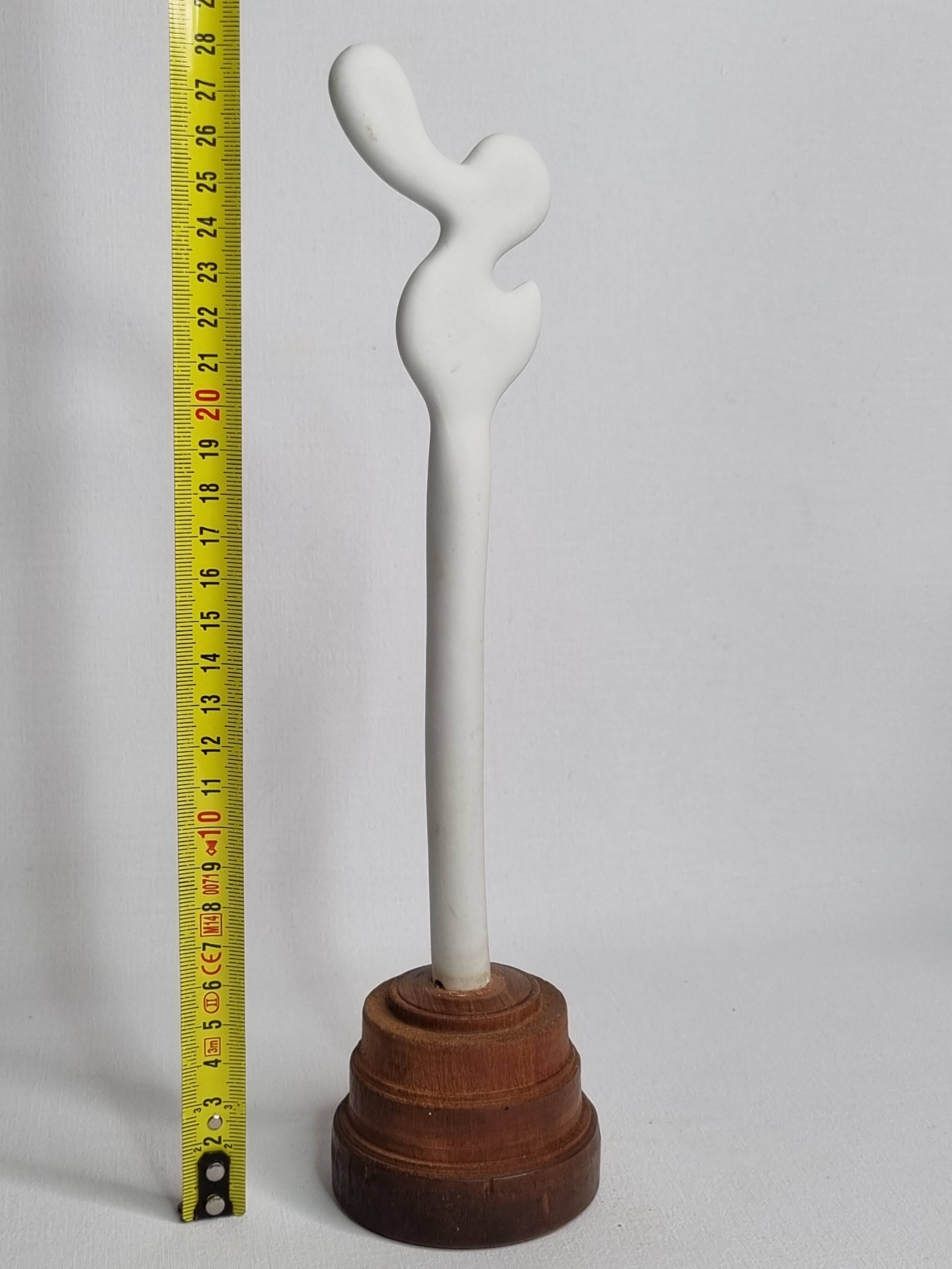 Biomorphic-inspired sculpture, on an industrial wooden base, 28 cm