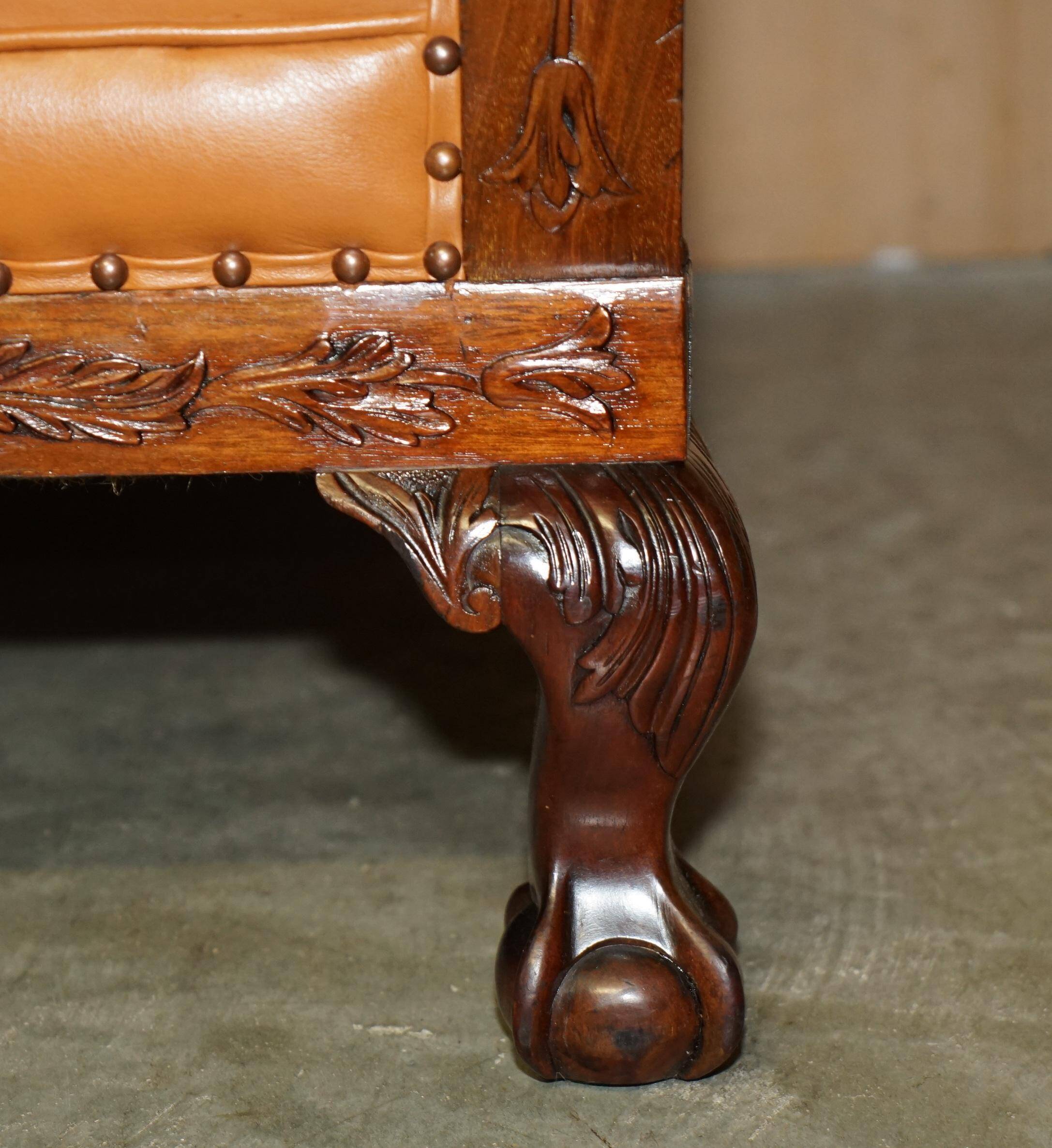Restored three-seater leather canapé in late Victorian style.