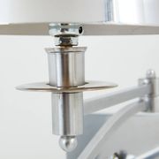 Pair of Maison Charles adjustable brushed steel wall lights circa 1960