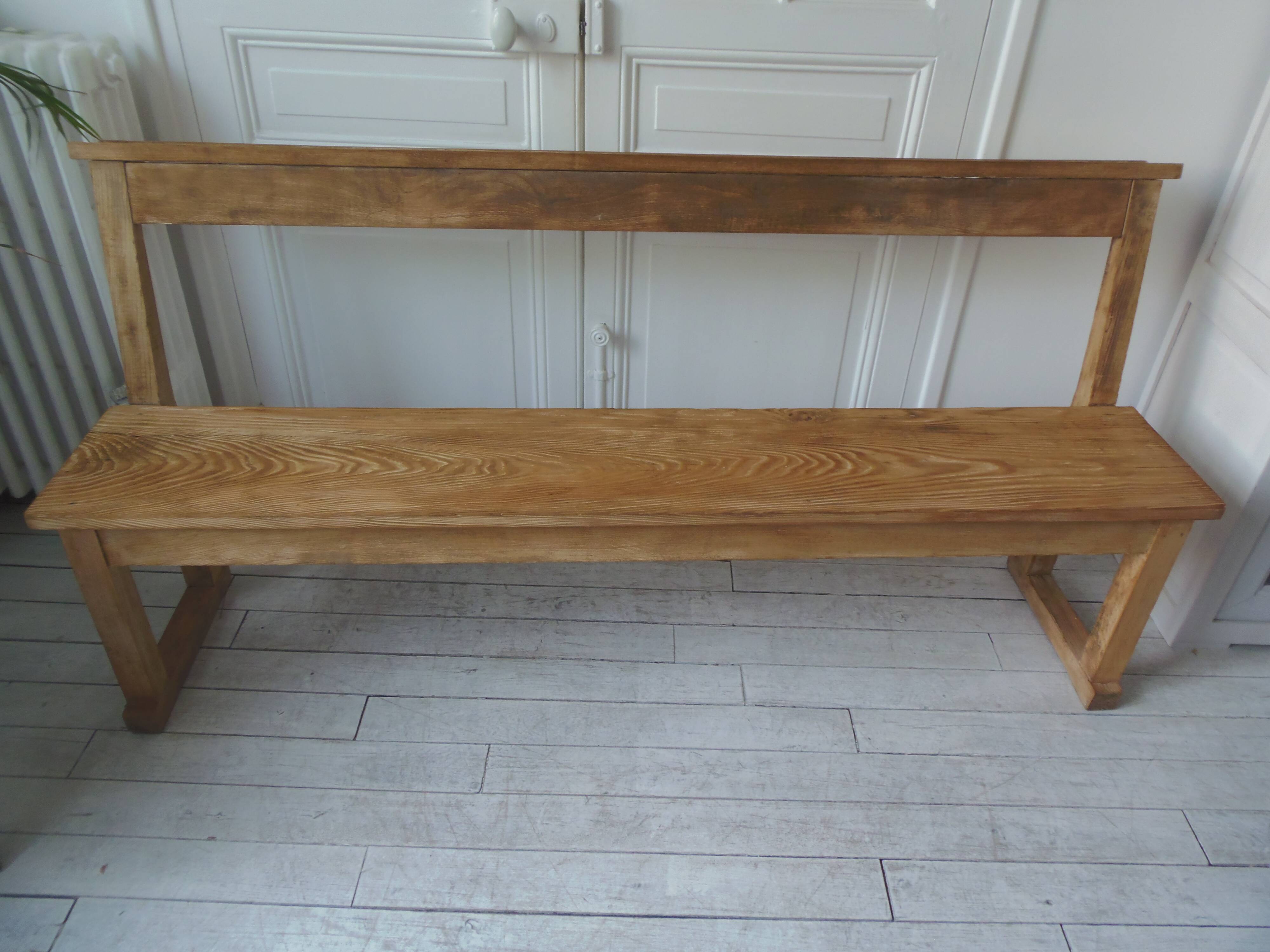 Church bench, bed end in pitch pine with light oak wax finish.