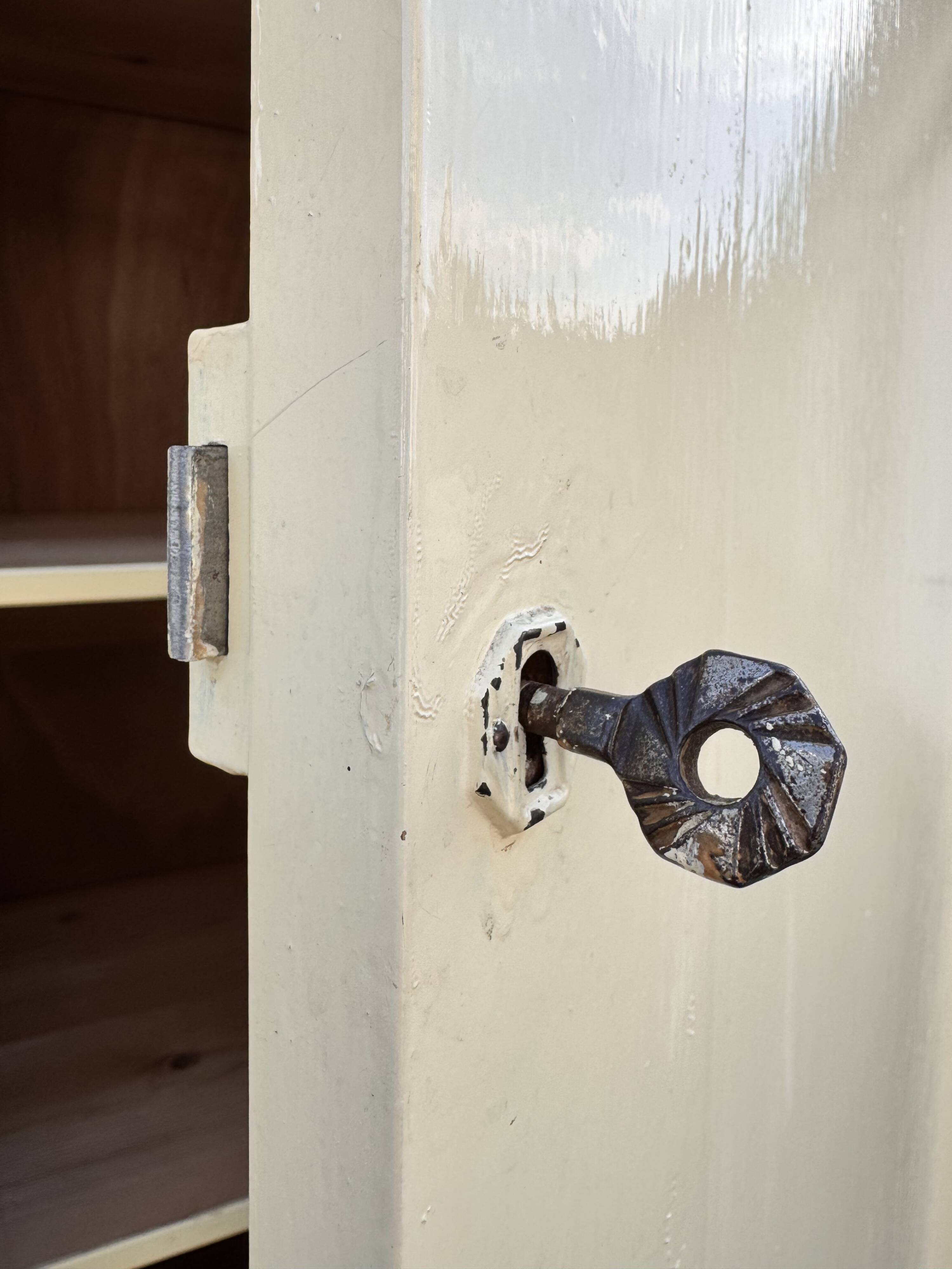 Antique painted wooden bonnet maker