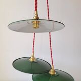 Trio of enameled sheet metal pendant lights