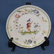 Pair of plates Moustiers décor to musician