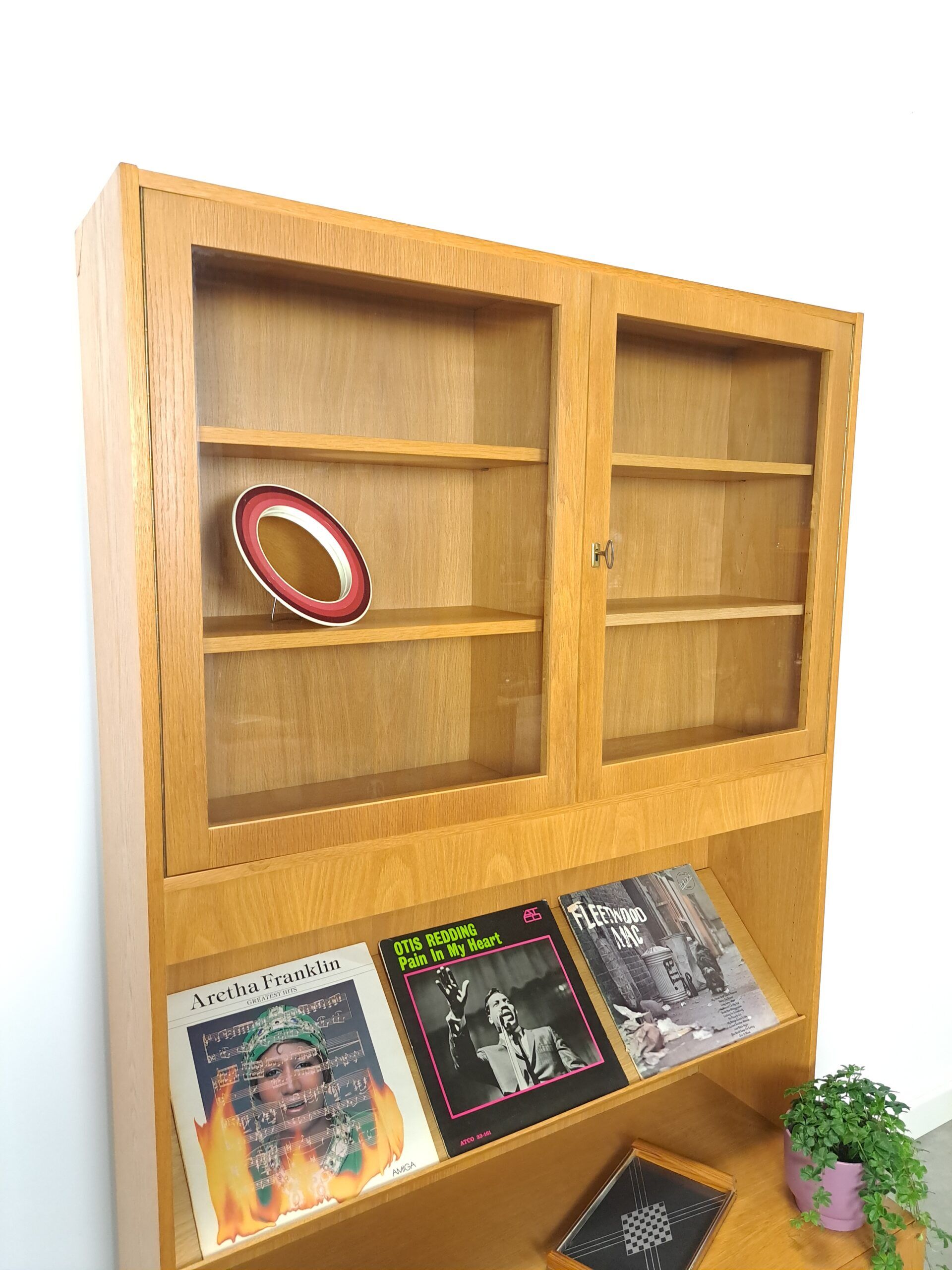 Tall LP display cabinet with glass doors and magazine shelf from Sweden