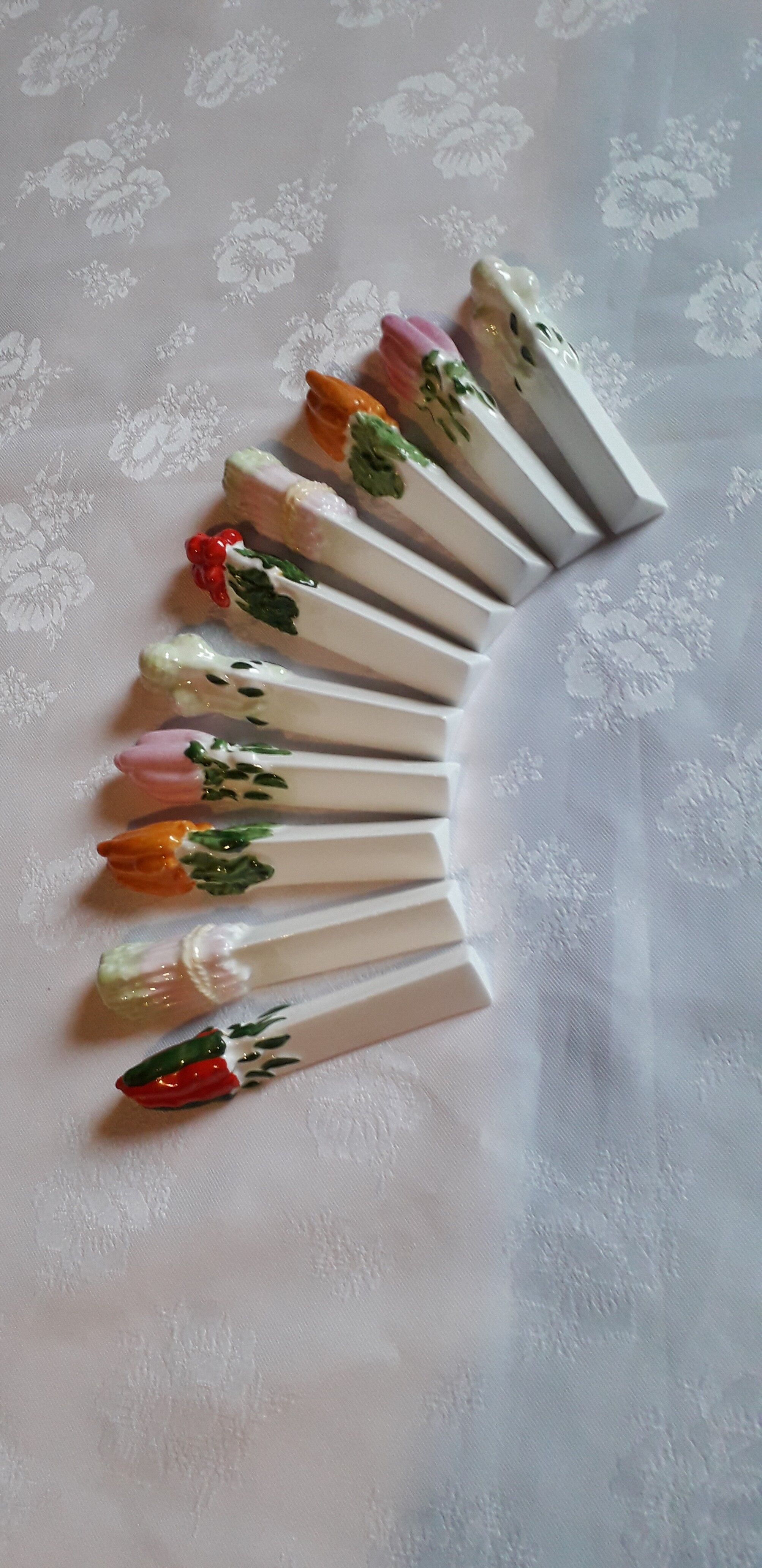 A set of 10 porcelain knife holders decorated "vegetables"