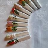 A set of 10 porcelain knife holders decorated "vegetables"