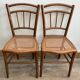 Set of 2 antique wooden bistro chairs canned seats
