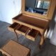 Hairdresser's chair with a rattan stool