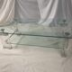 Coffee table made of glass and plexiglass.