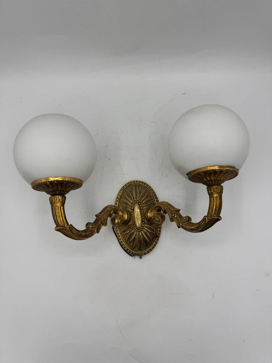 Double gold wall light