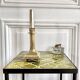 Empire style gold candle holder