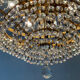 Chandelier cascade of tassels and brass