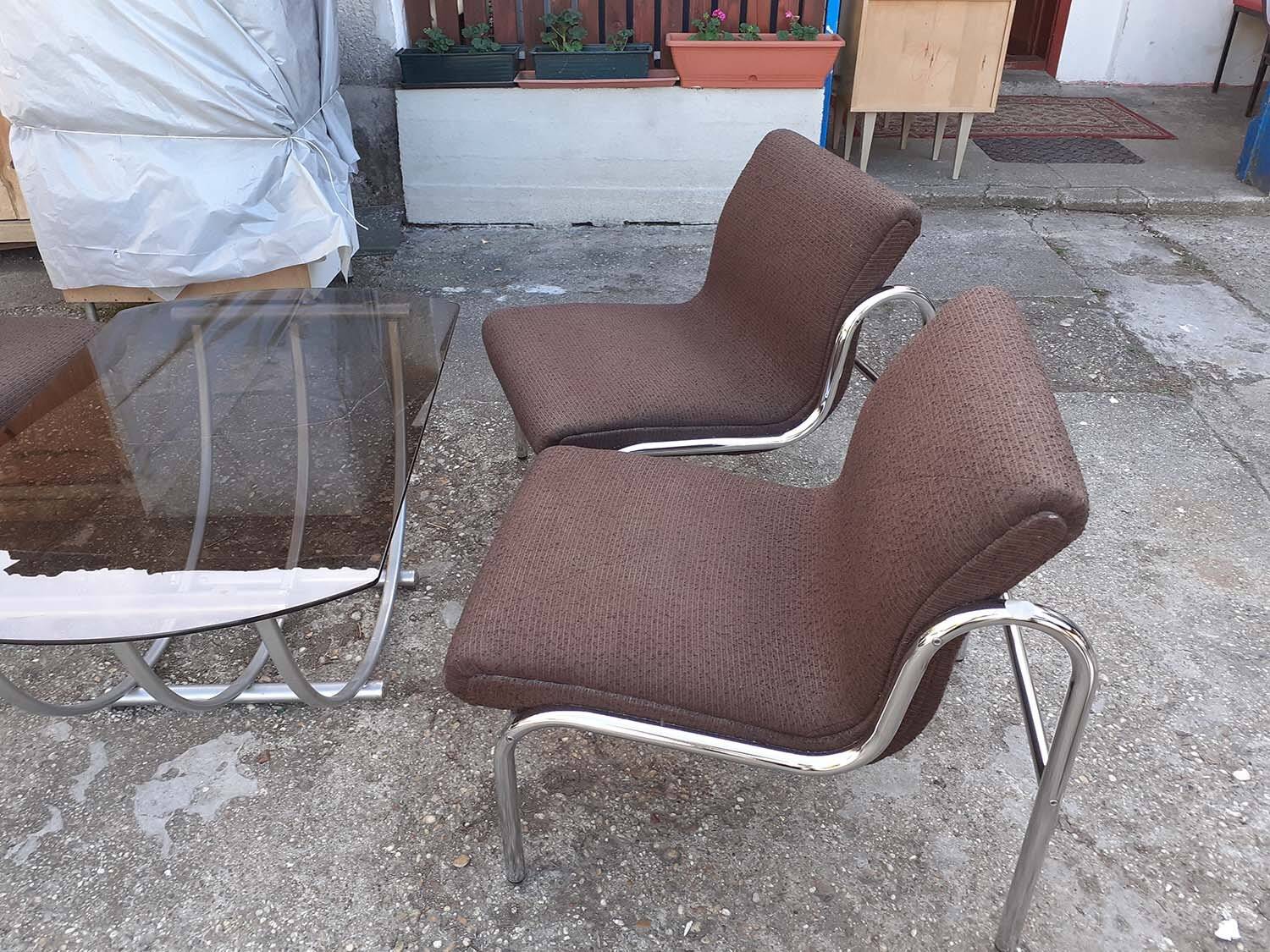 Table and 4 chairs in chrome metal with brown fabric and wood, Hungarian design from the 1960s.