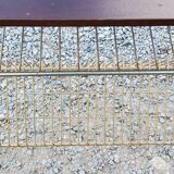 Side table of the 60s mahogany and gold metal range discs