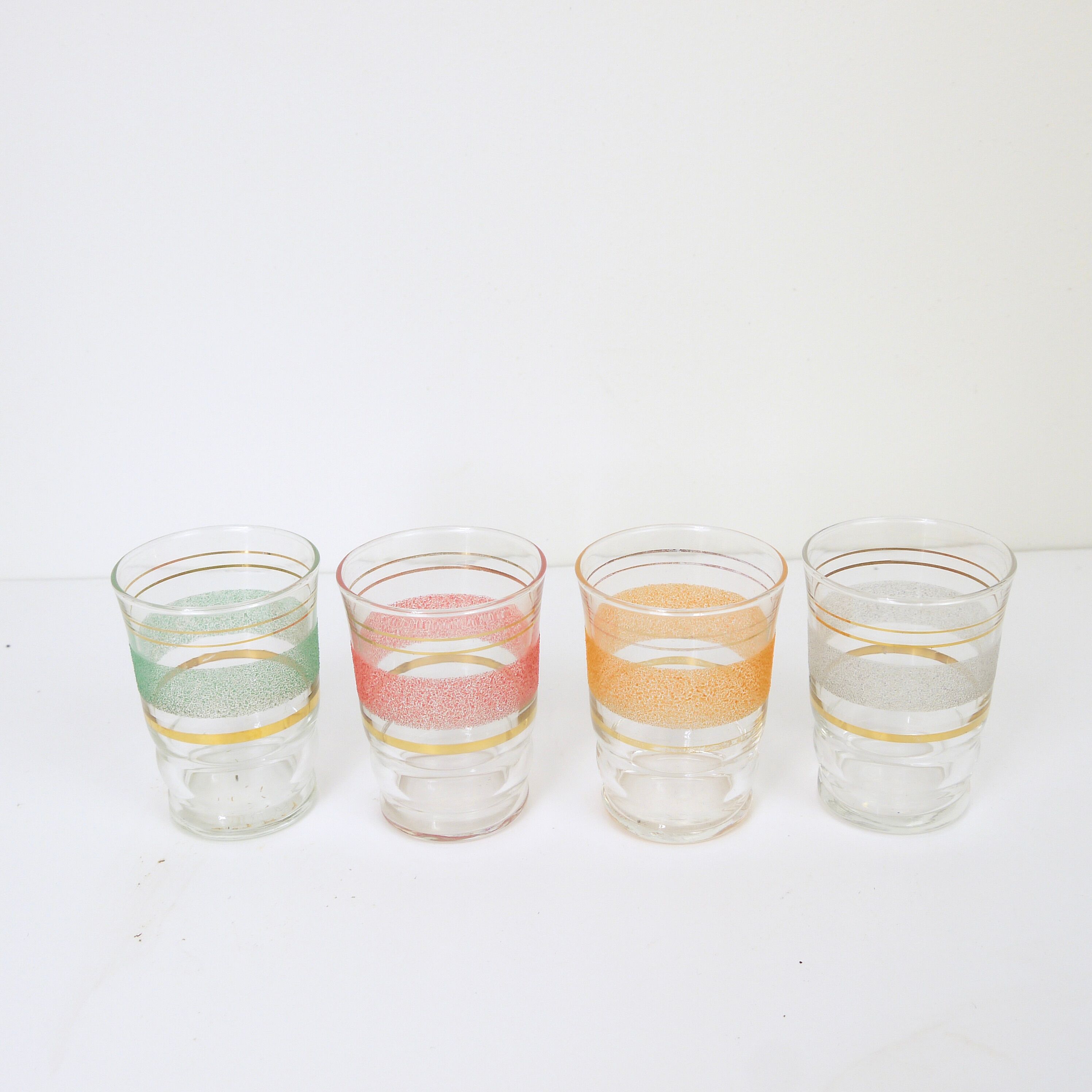 13 glasses with granite liqueurs