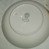 9 hollow plates caps in faience with decor of a rosebud