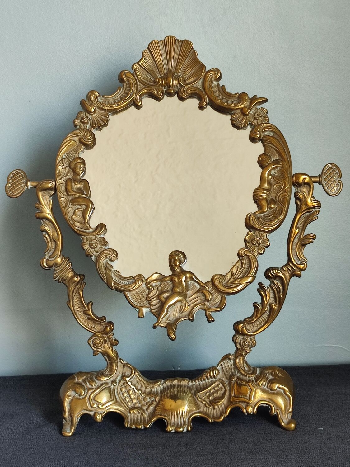 Ancient mirror psyche in bronze