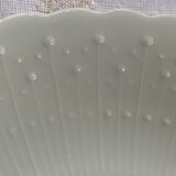 white plate with white Limoges pattern