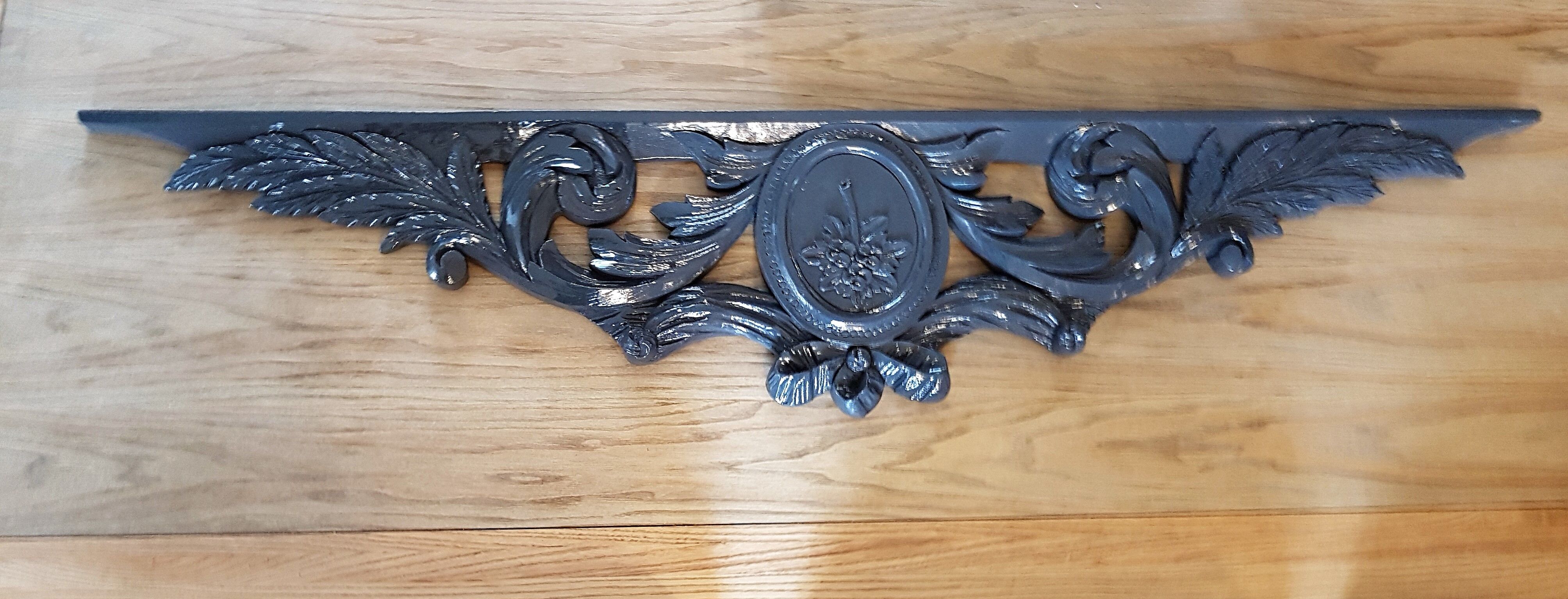 Old carved wooden pediment