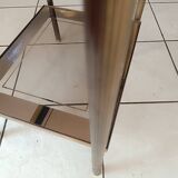 Smoked glass coffee table. 2 shelves. Metal frame. 1960s.