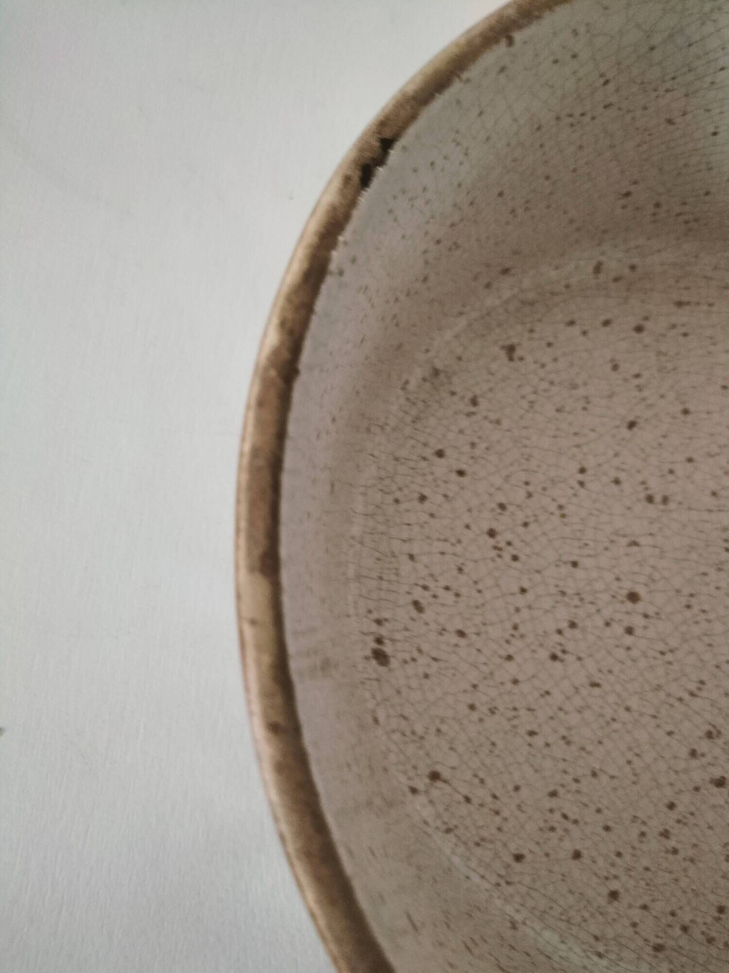 Vintage dish with black and ochre decoration and a speckled crackled interior – 1970s