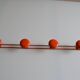 Vintage 70s orange lacquered metal 4-hook wall coat rack
