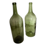 Pair of large antique blown glass bottles