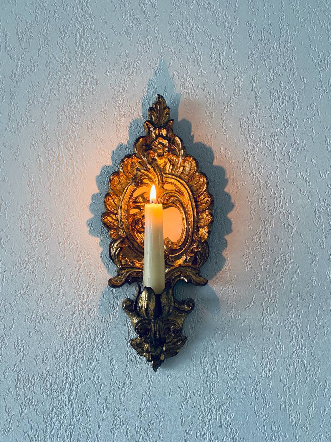 Gold wall candle holder