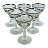 Set of 8 stemmed port glasses with silver trim.