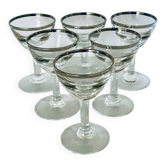 Set of 8 stemmed port glasses with silver trim.