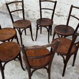 Série de 7 anciennes chaises bistrot Baumann bois courbé assise ronde